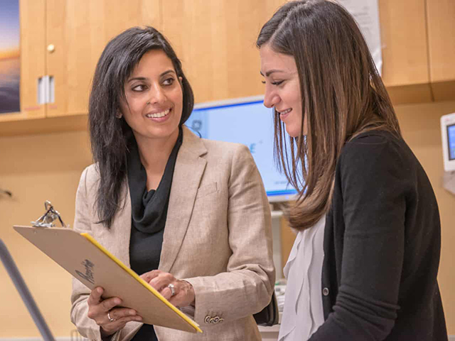 Dr-Grewal-and-patient-640x480